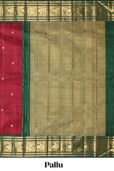 Maroon zari motifs parambariya pattu saree with contrast zari border and blouse