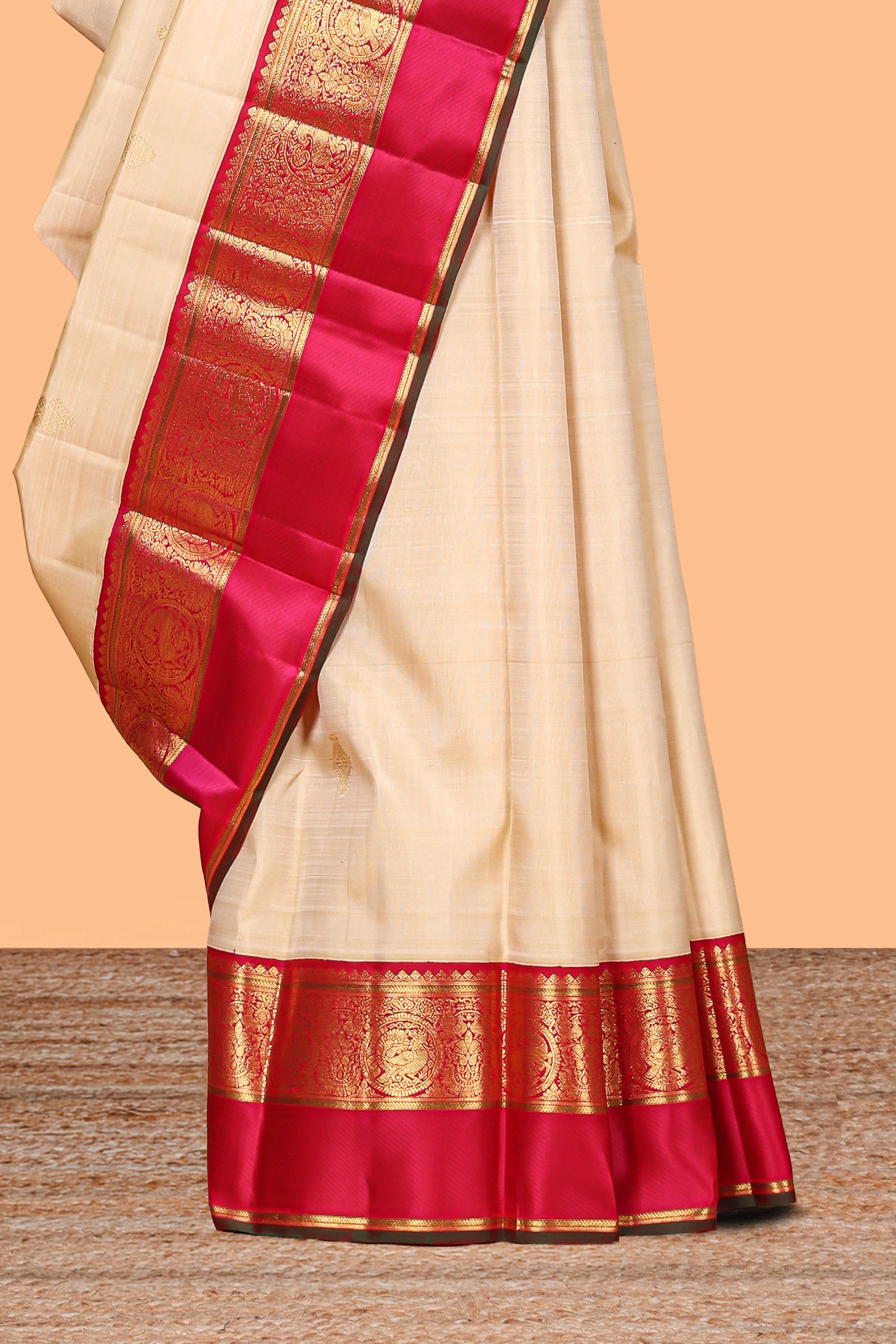 Beige zari motifs parambariya pattu saree with contrast zari border and blouse