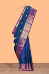 Blue zari motifs parambariya pattu saree with contrast zari border and blouse