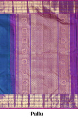 Blue zari motifs parambariya pattu saree with contrast zari border and blouse
