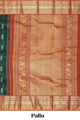 Bottle green floral design zari motifs parambariya pattu saree with contrast zari border and contrast blouse