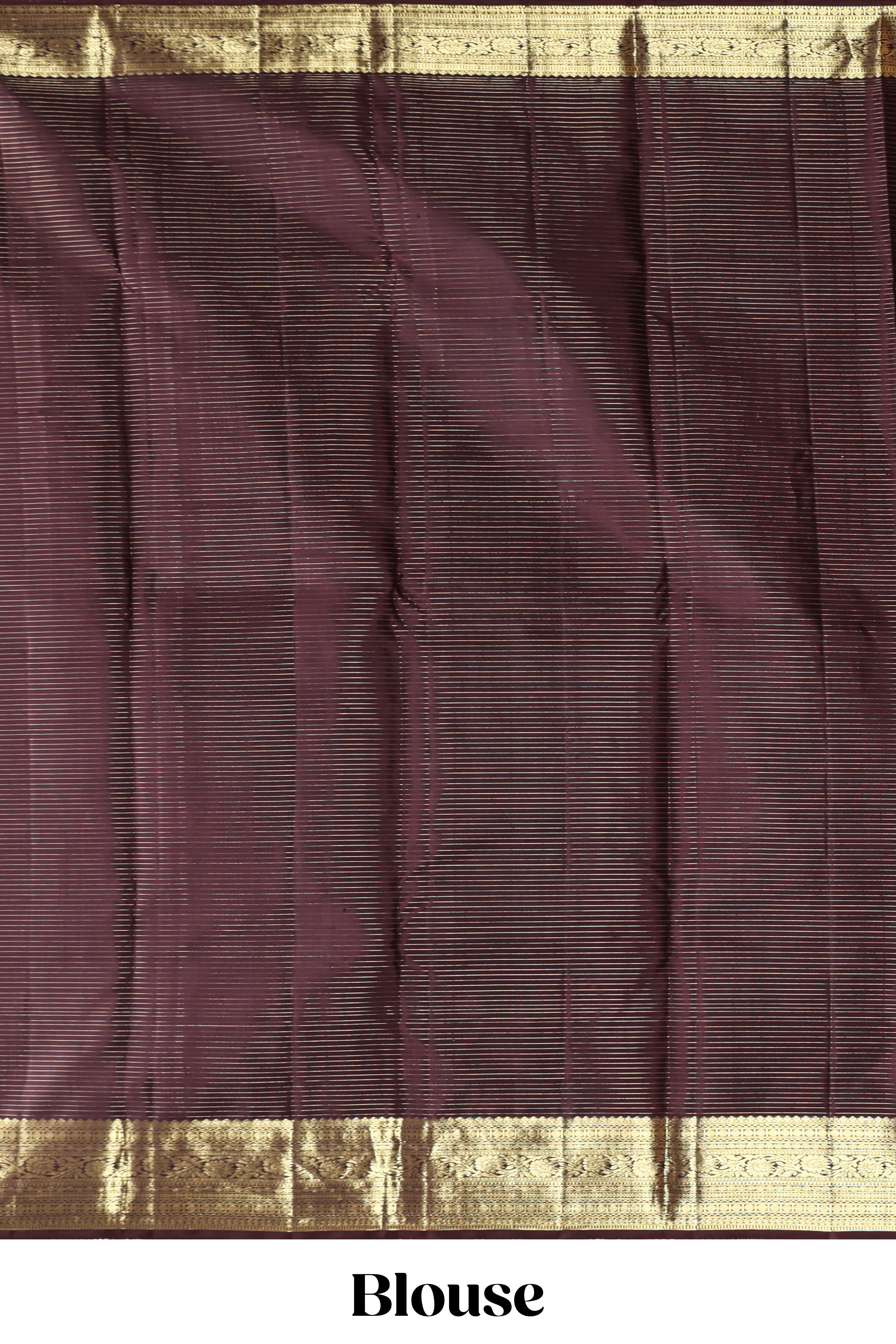 Green checked floral design zari motifs parambariya pattu saree with contrast zari border and contrast blouse