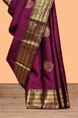 Magenta floral design zari motifs parambariya pattu saree with self zari border and matching blouse