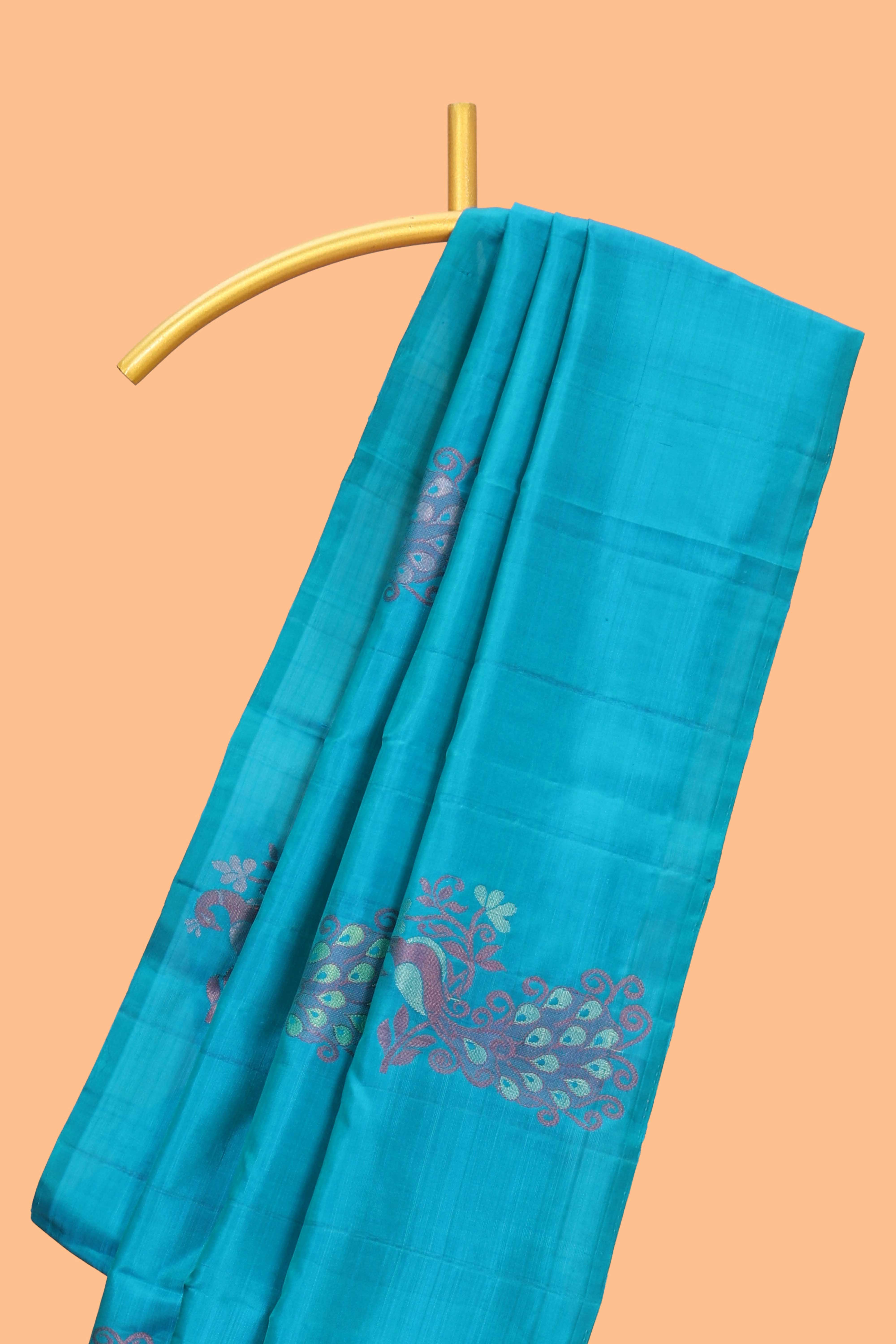 Borderless blue peacock design motifs parambariya pattu saree with contrast pallu and blouse