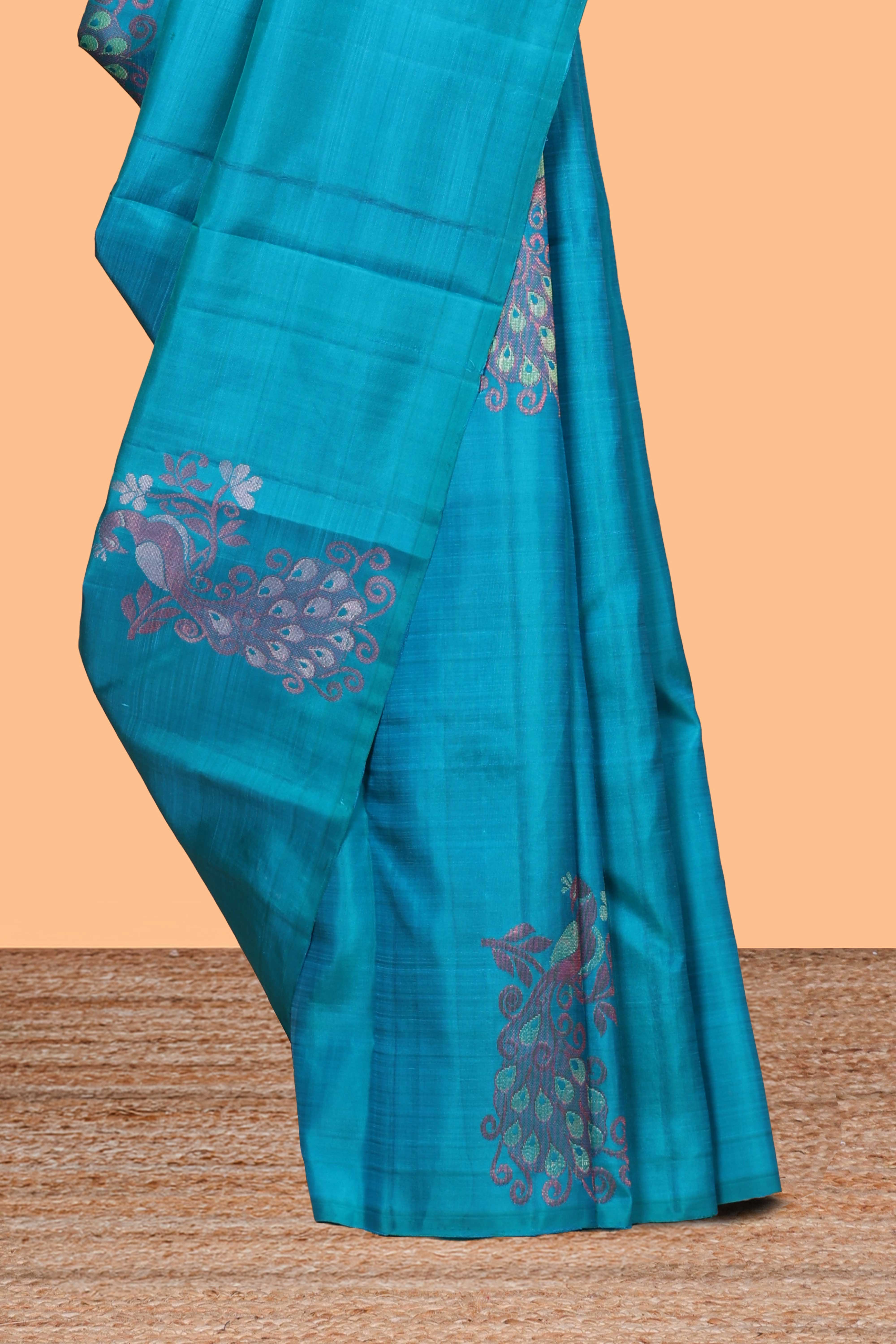Borderless blue peacock design motifs parambariya pattu saree with contrast pallu and blouse