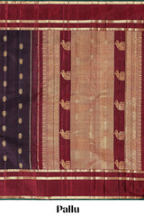 Dark purple zari motifs parambariya pattu saree with contrast zari border and blouse