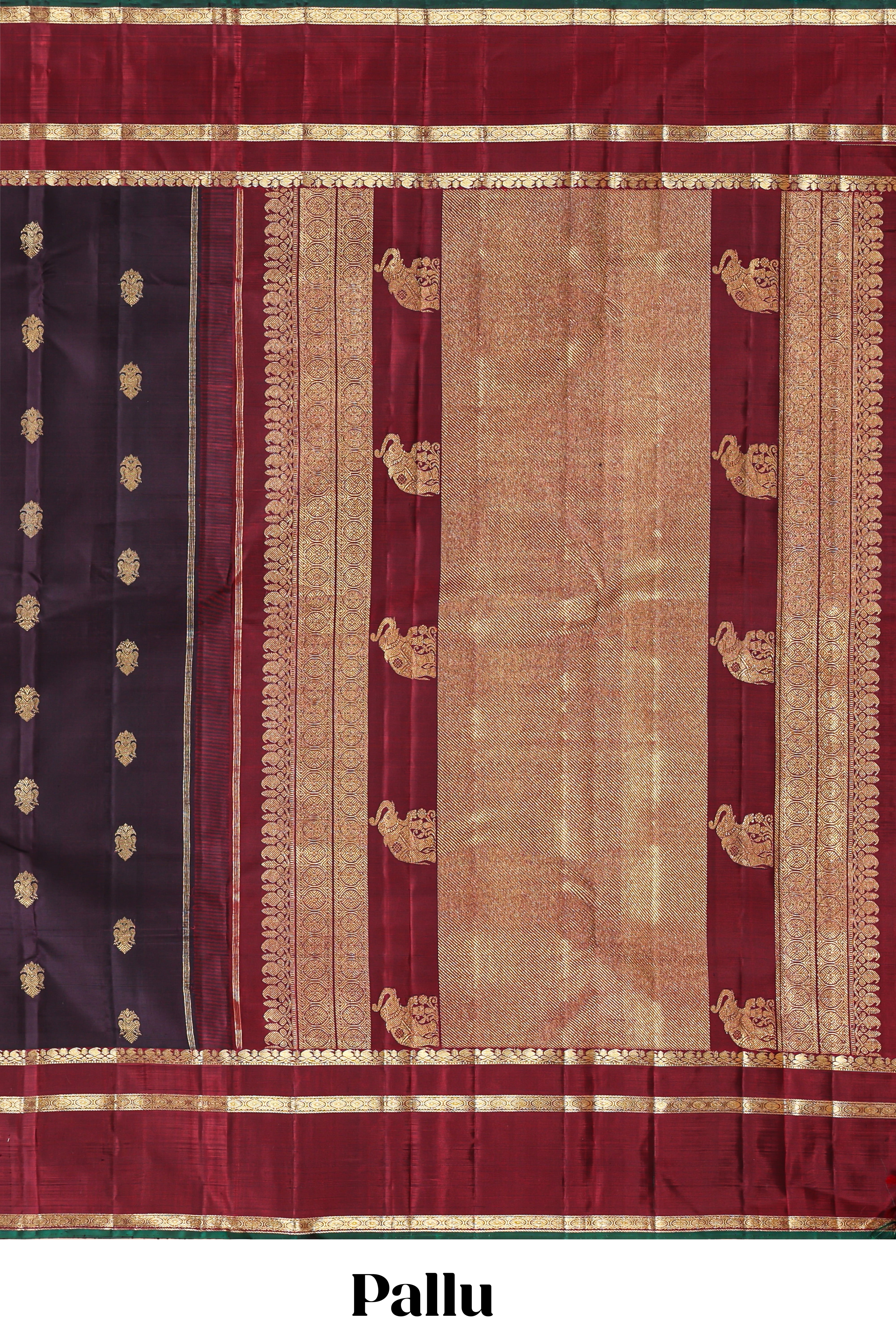 Dark purple zari motifs parambariya pattu saree with contrast zari border and blouse