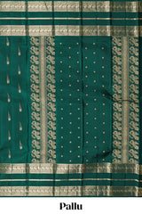 Dark green gold zari butta motifs parambariya pattu saree with self zari border and matching blouse