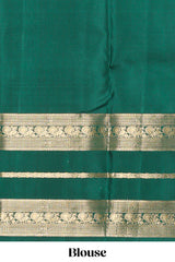 Dark green gold zari butta motifs parambariya pattu saree with self zari border and matching blouse
