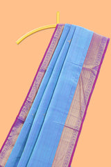 Blue color butta designed parambariya pattu saree with contrast zari border and rich peacock zari motifs pallu