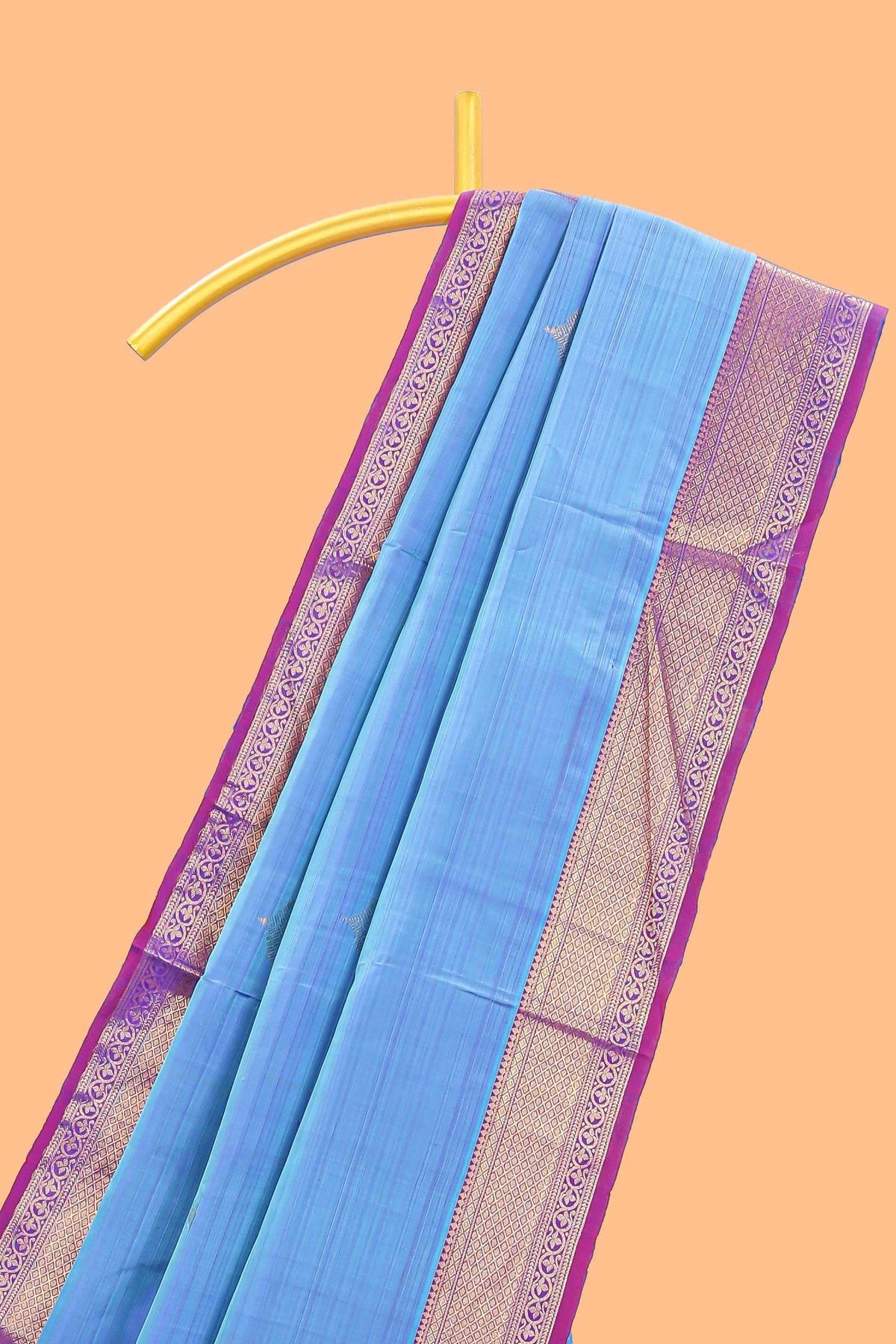 Blue color butta designed parambariya pattu saree with contrast zari border and rich peacock zari motifs pallu