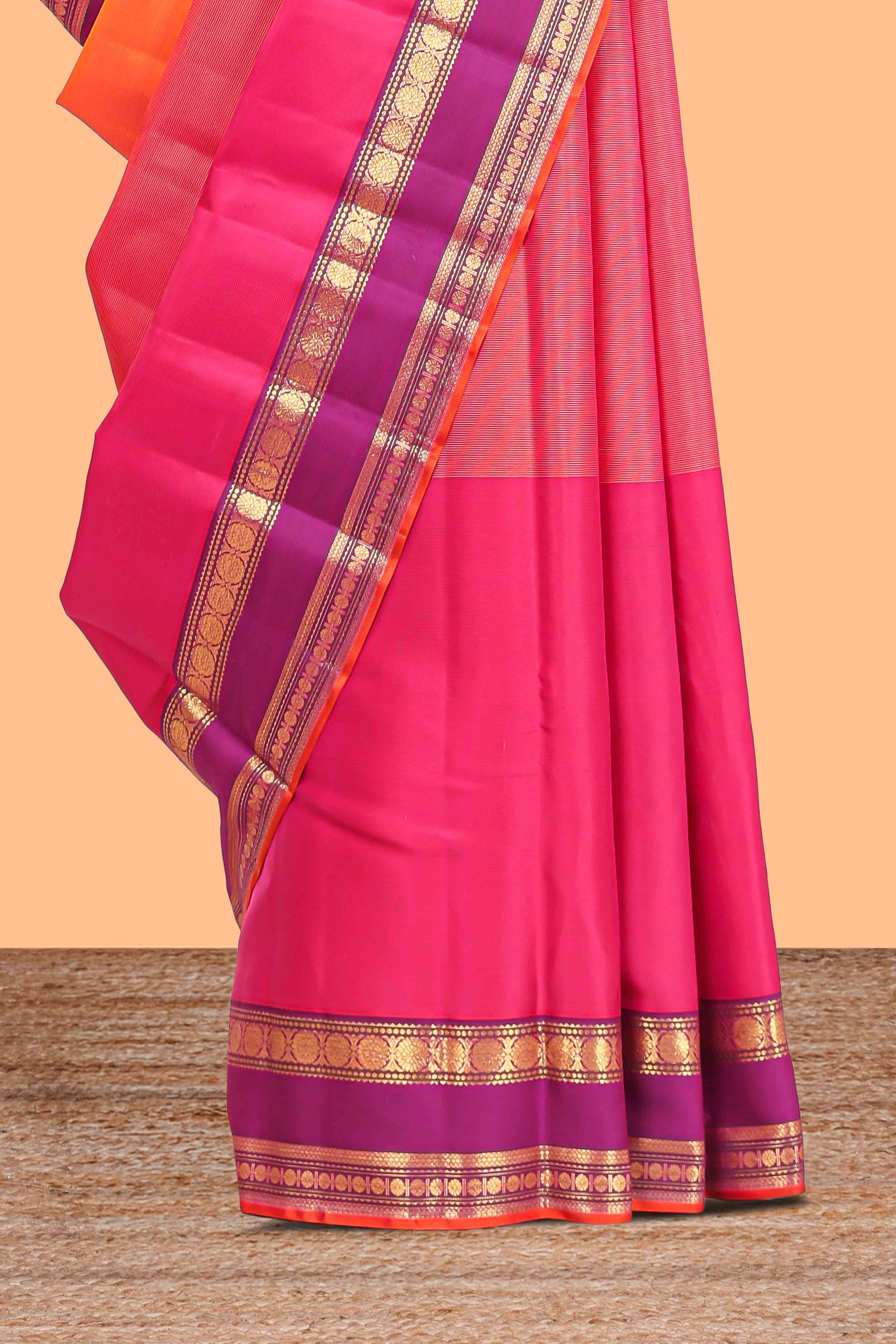 Multicolor plain parambariya pattu saree with contrast purple stripe with zari edging with zari butta pallu with floral blouse