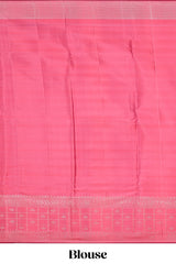 Soft pastel pink zari striped parambariya pattu saree with checked zari border with buttas and pallu comes with plain blush pink blouse