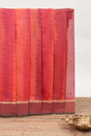 Brick red plain ikkat cotton saree with self border and zari striped pallu