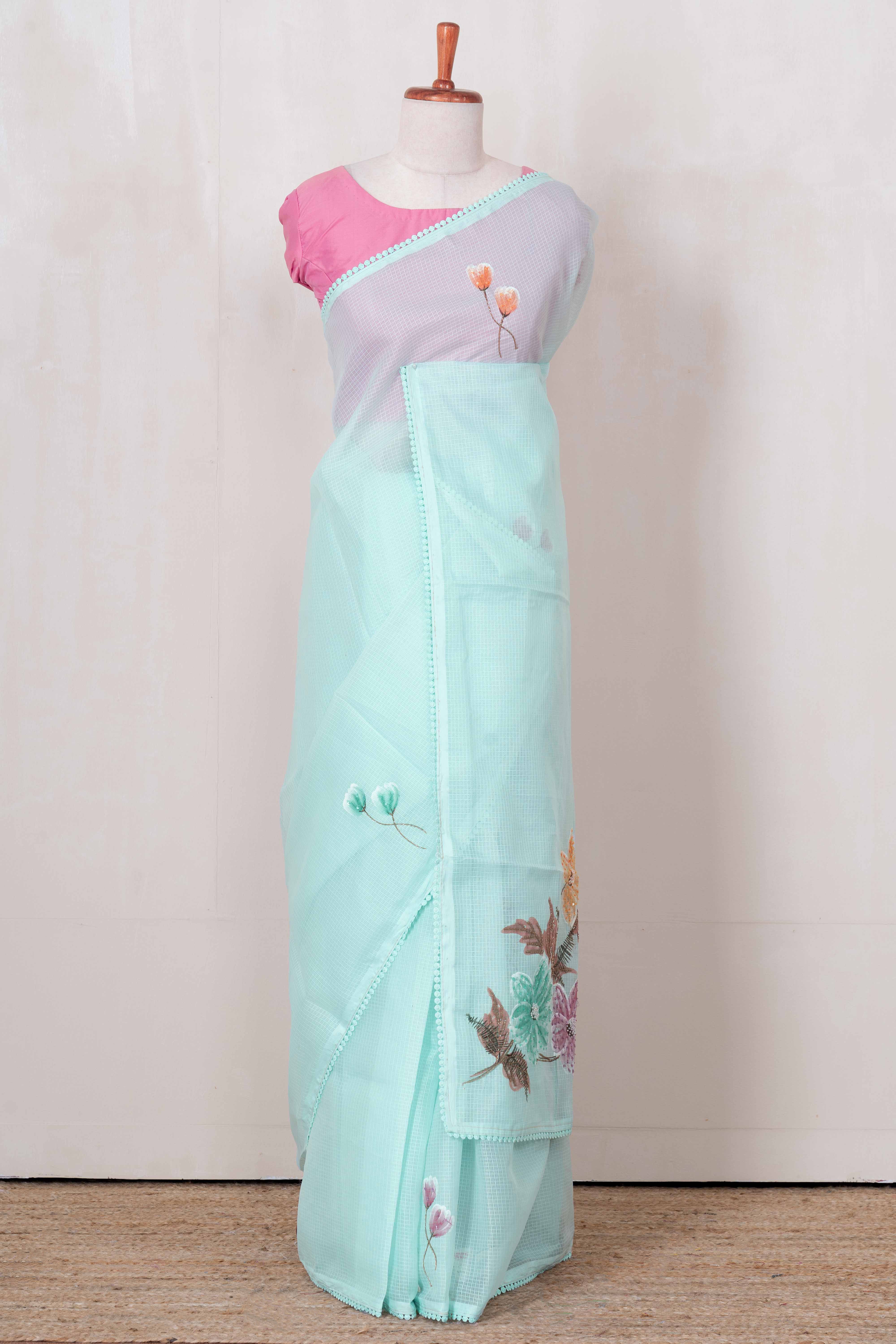 Peach doria hand brush print across the body along Kota cotton saree