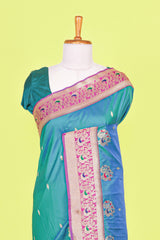 Peacock green art silk woven saree