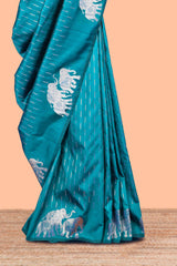 Peacock green semi soft silk woven saree