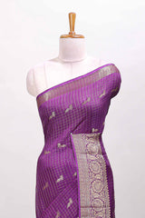 Purple art raw silk self border saree