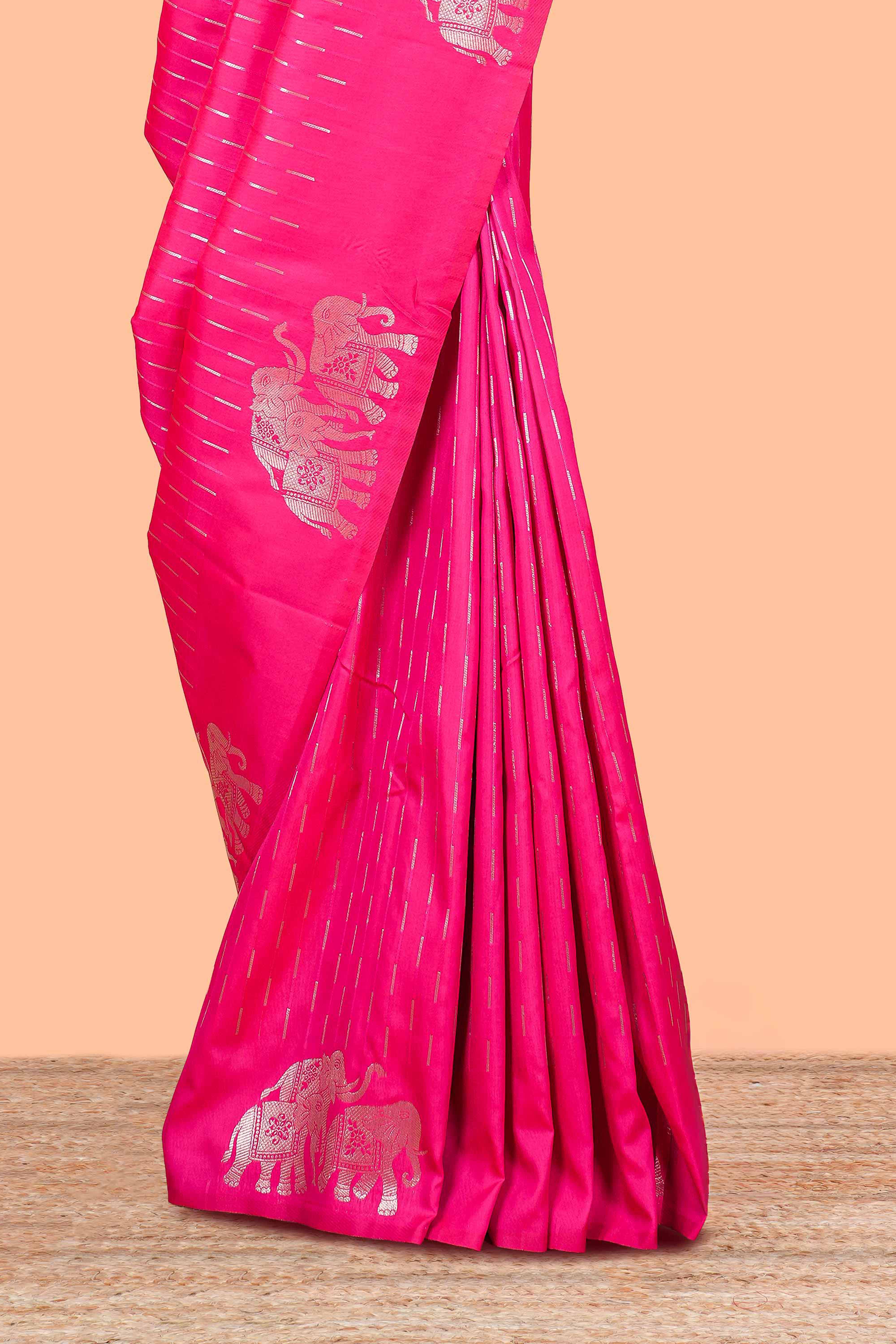 Rani pink semi soft silk woven saree