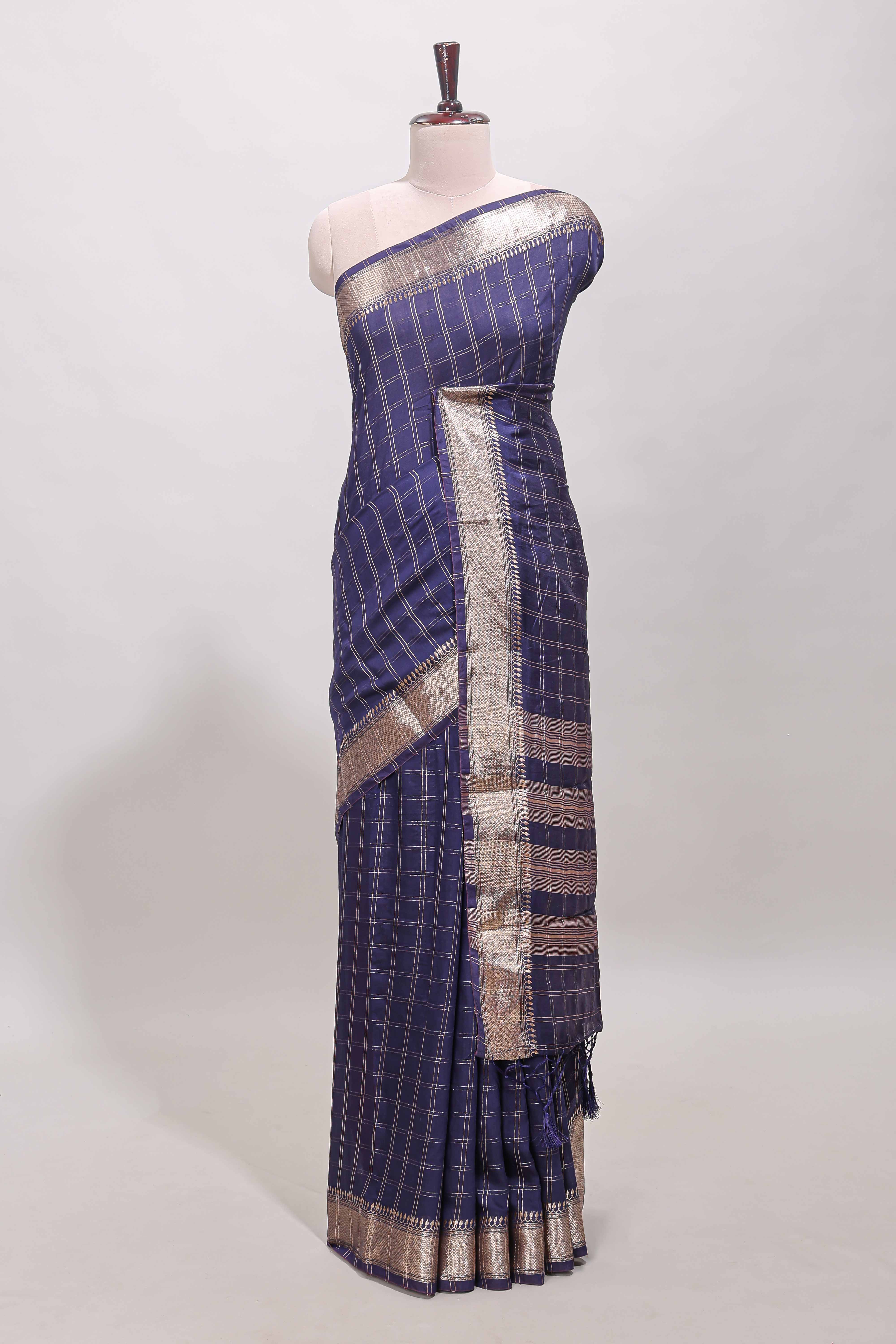 Navy blue checked semi banaras chiffon saree with self zari border and contrast blouse