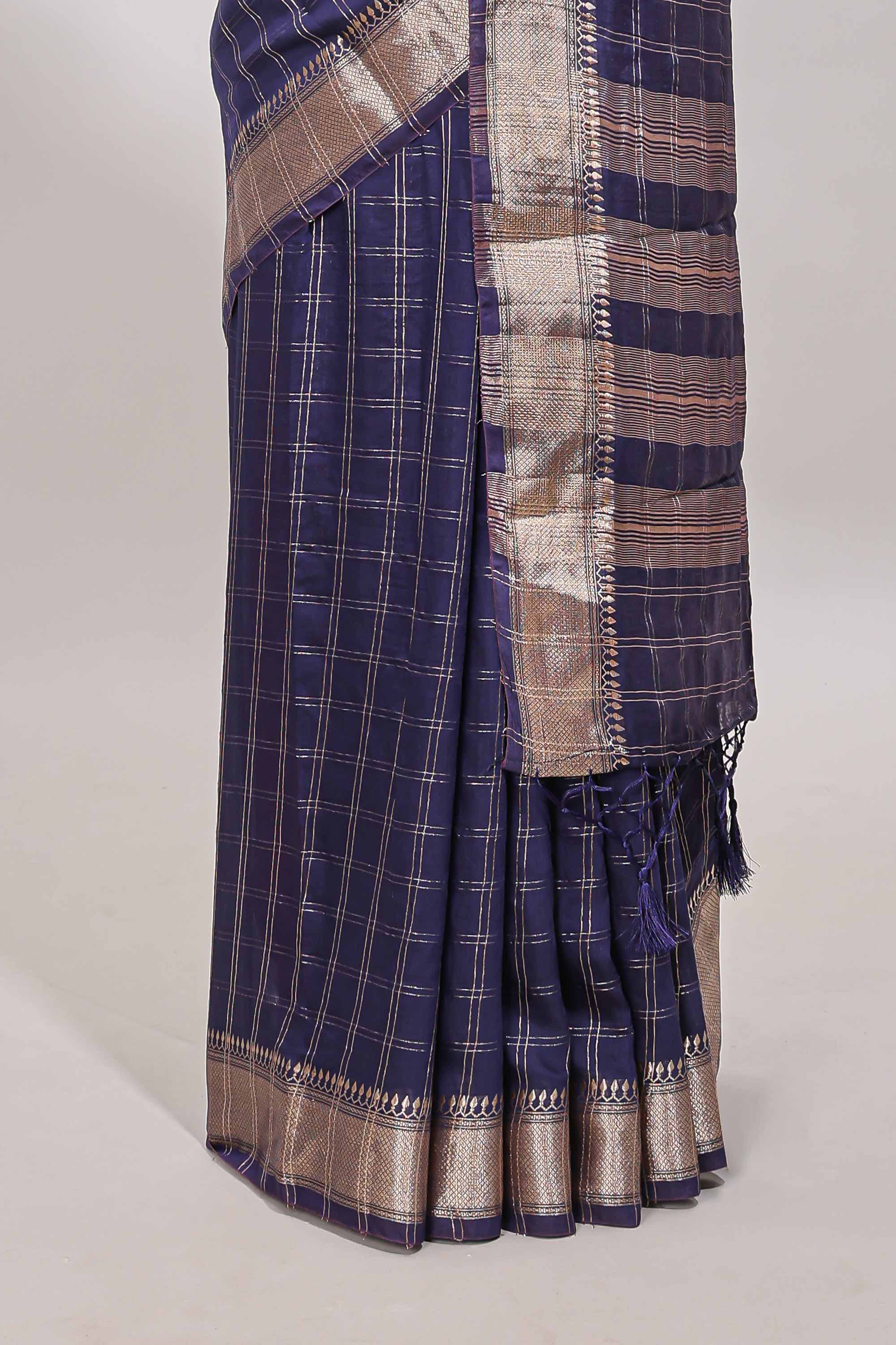 Navy blue checked semi banaras chiffon saree with self zari border and contrast blouse