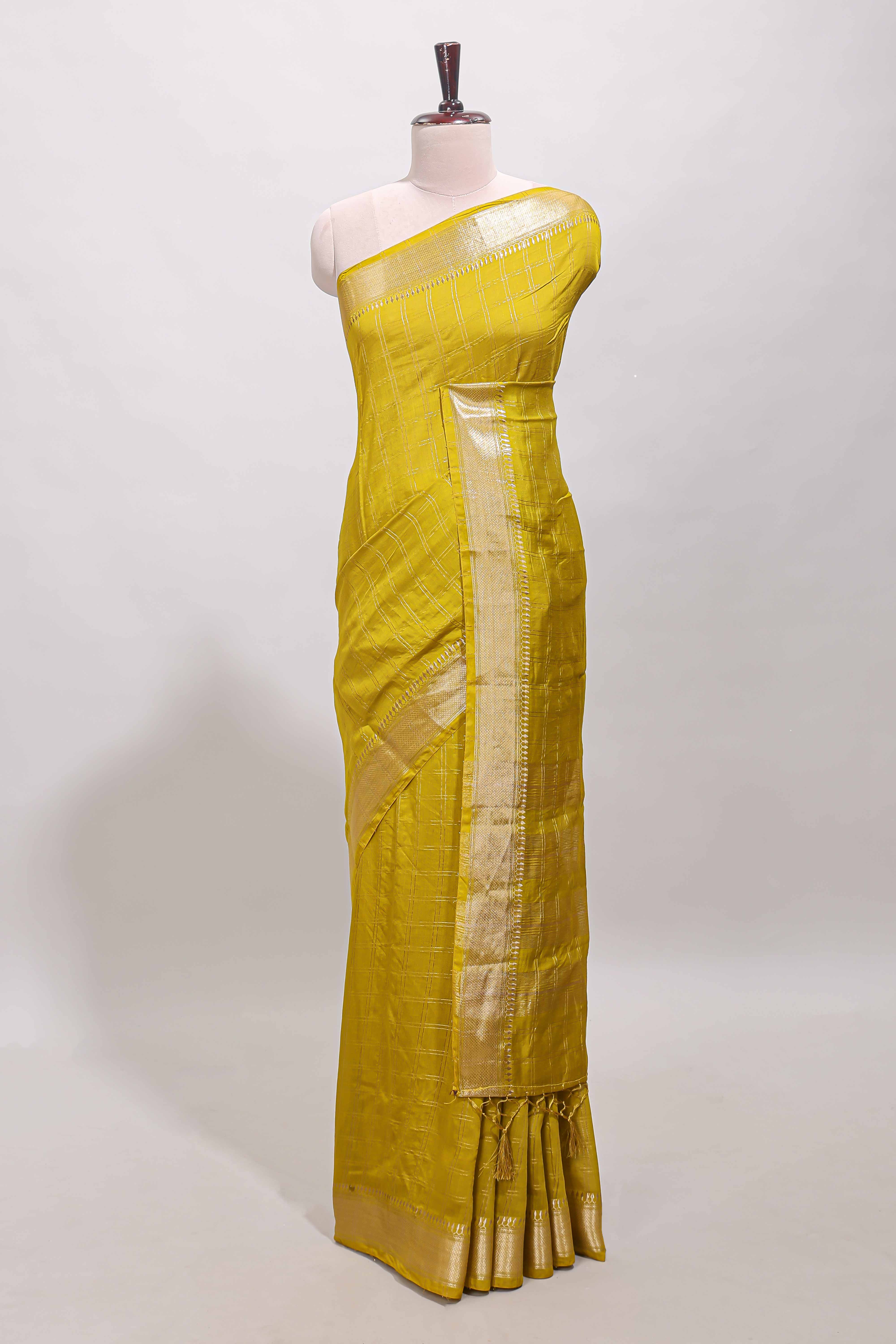 Lemon yellow checked semi banaras chiffon saree with self zari border and contrast blouse