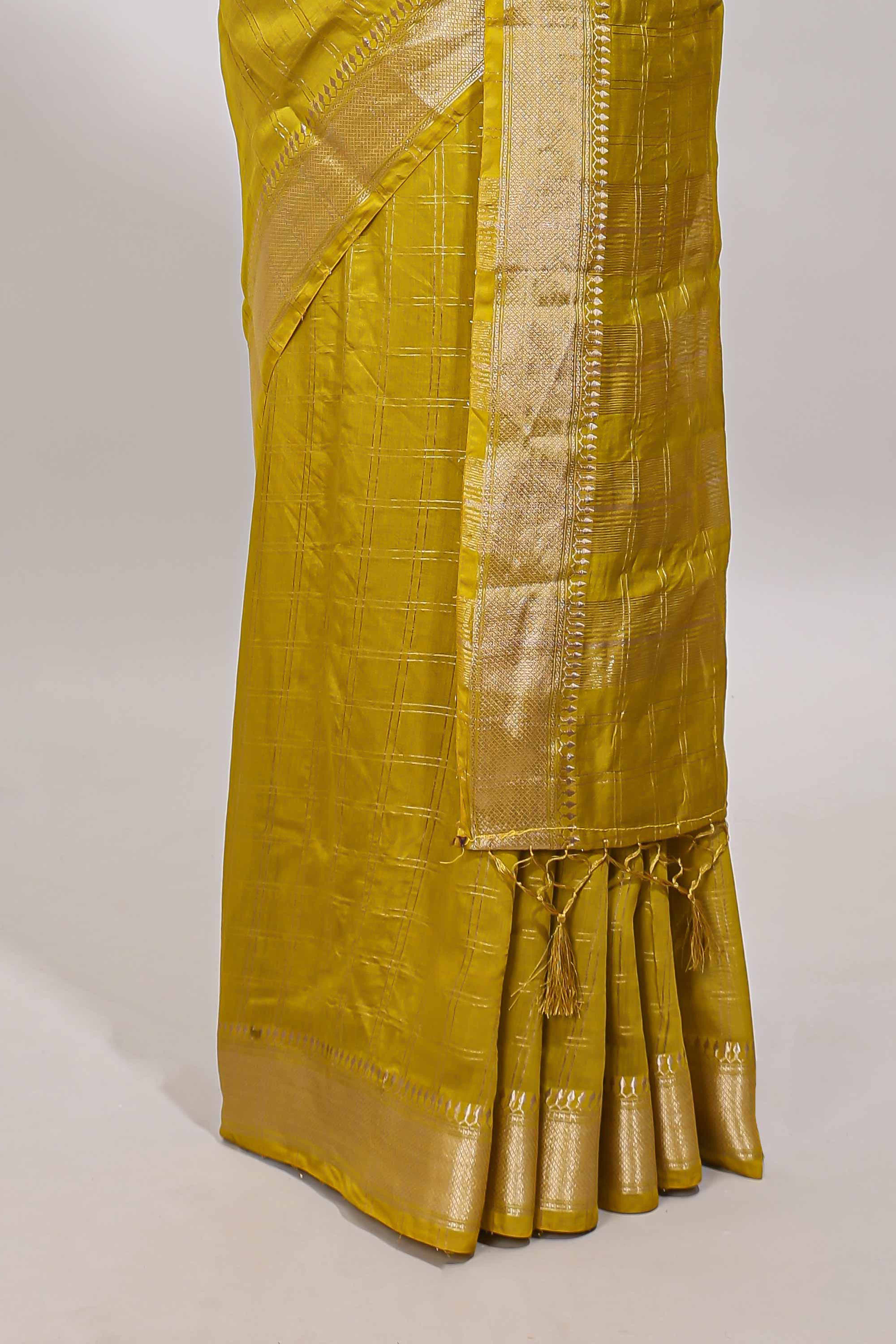 Lemon yellow checked semi banaras chiffon saree with self zari border and contrast blouse