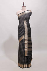 Black checked semi banaras chiffon saree with self zari border and contrast blouse