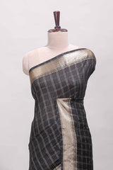 Black checked semi banaras chiffon saree with self zari border and contrast blouse