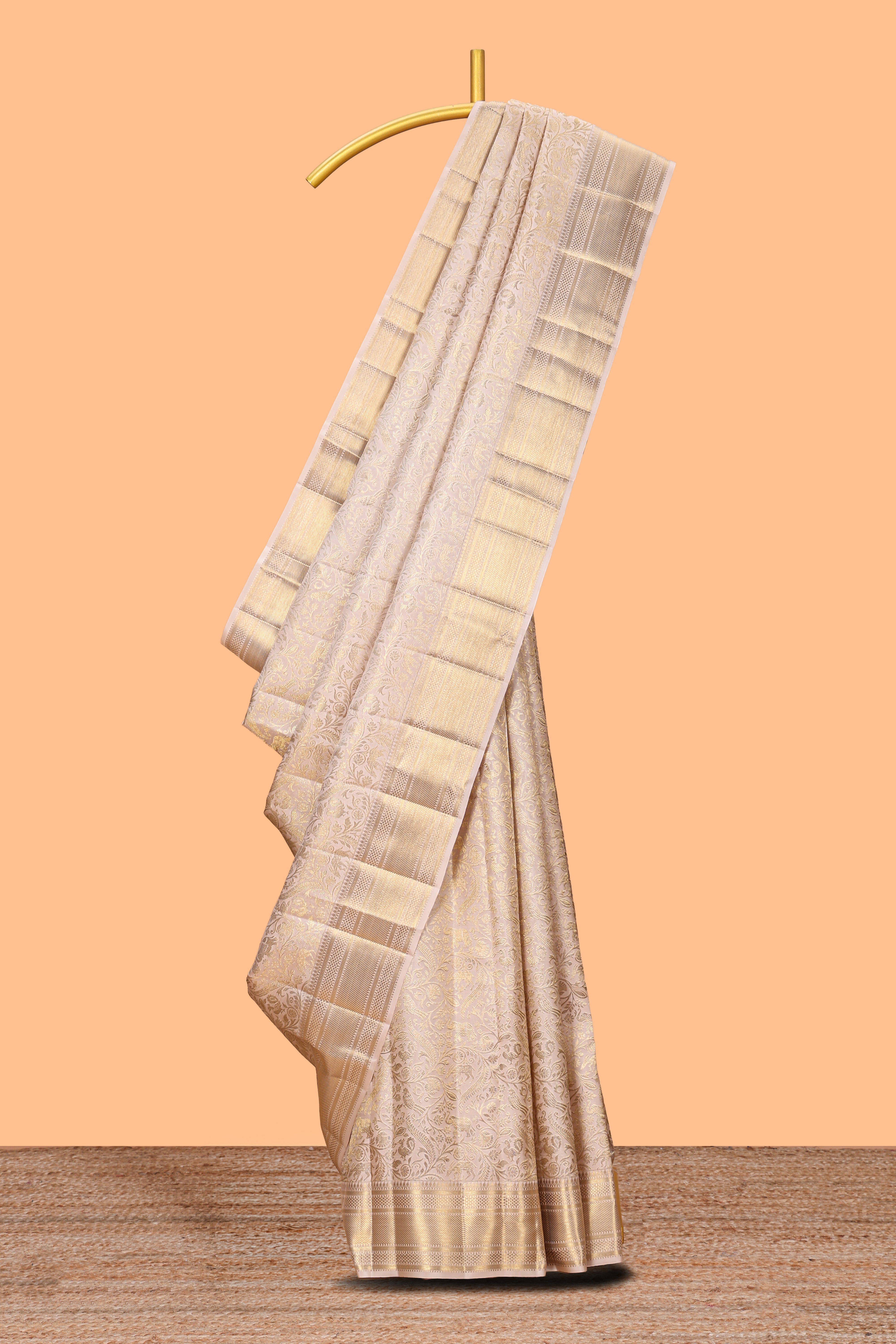 Pale beige floral zari design swayamvara pattu saree with self zari border and matching blouse
