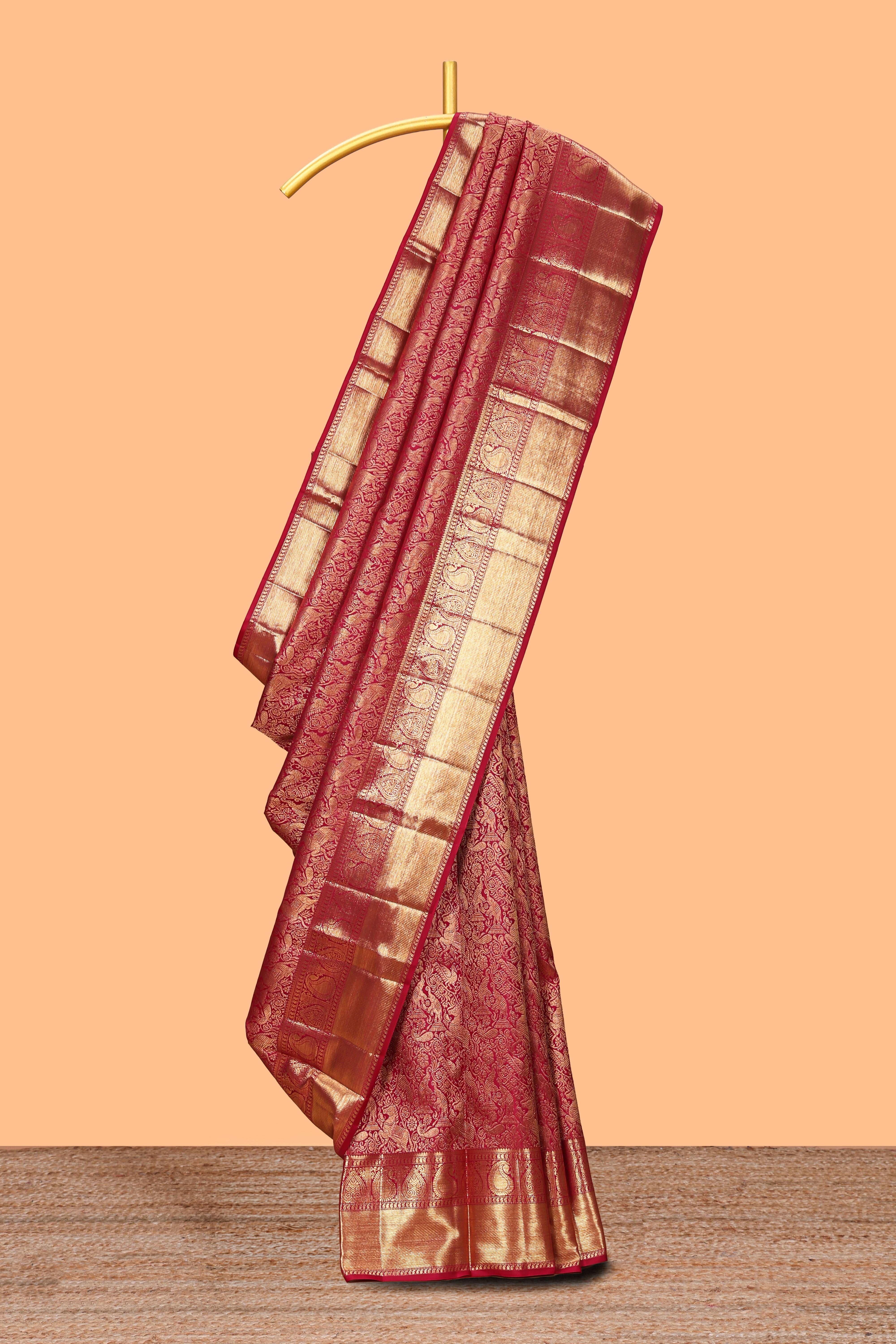 Red unique zari design swayamvara pattu saree with self zari border and matching blouse