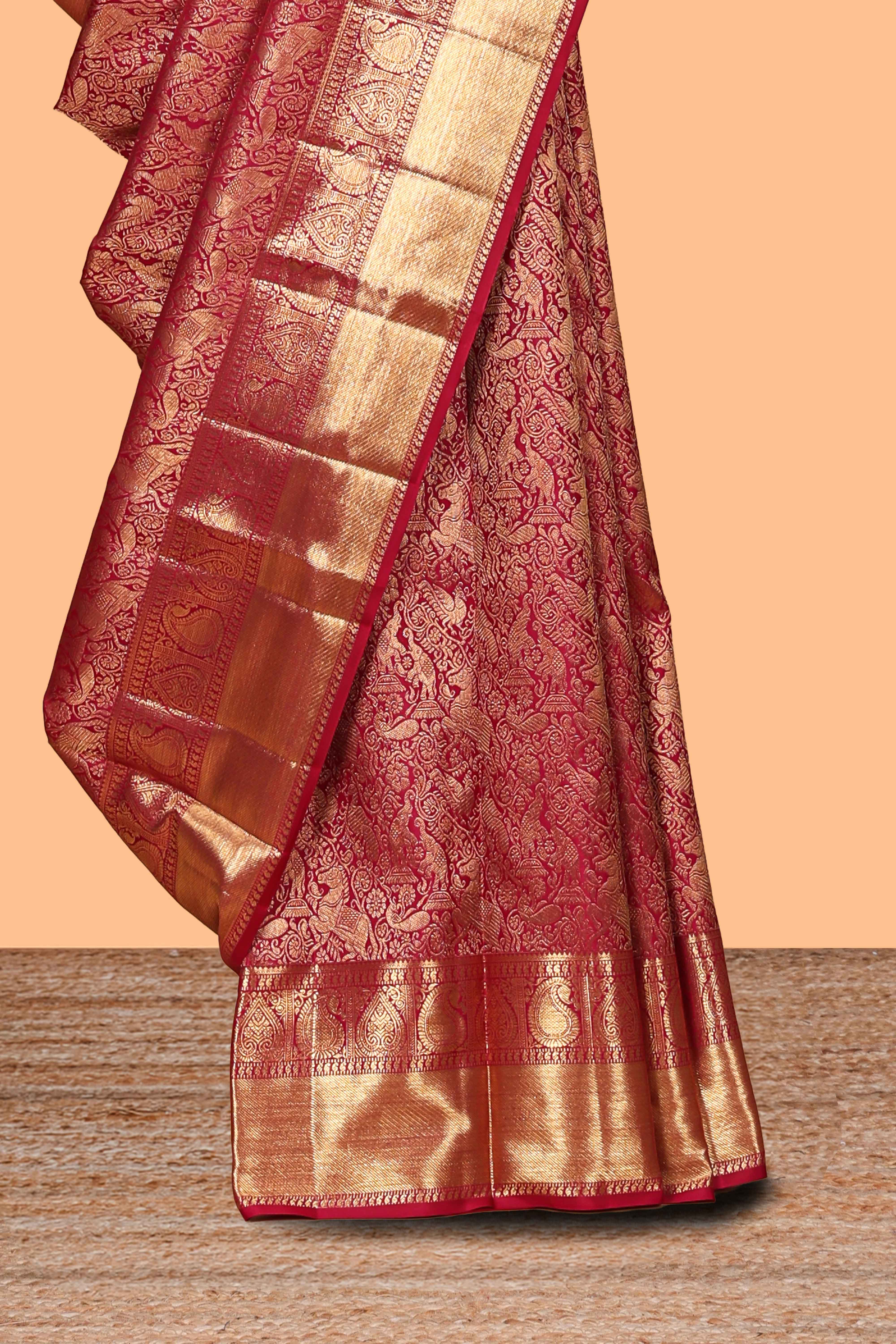 Red unique zari design swayamvara pattu saree with self zari border and matching blouse