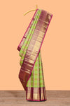 Green checked zari motifs design swayamvara pattu saree with contrast zari border and blouse