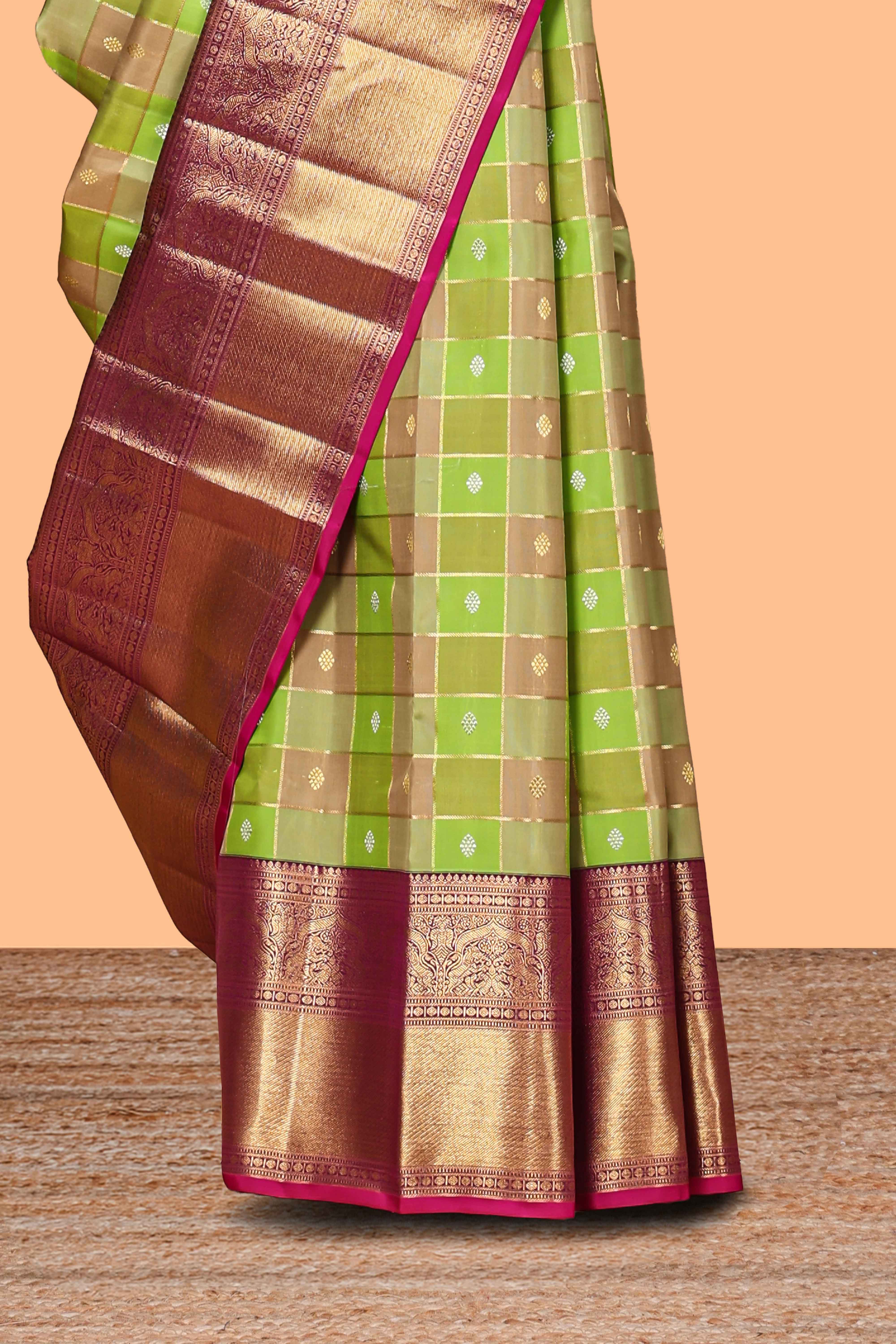 Green checked zari motifs design swayamvara pattu saree with contrast zari border and blouse