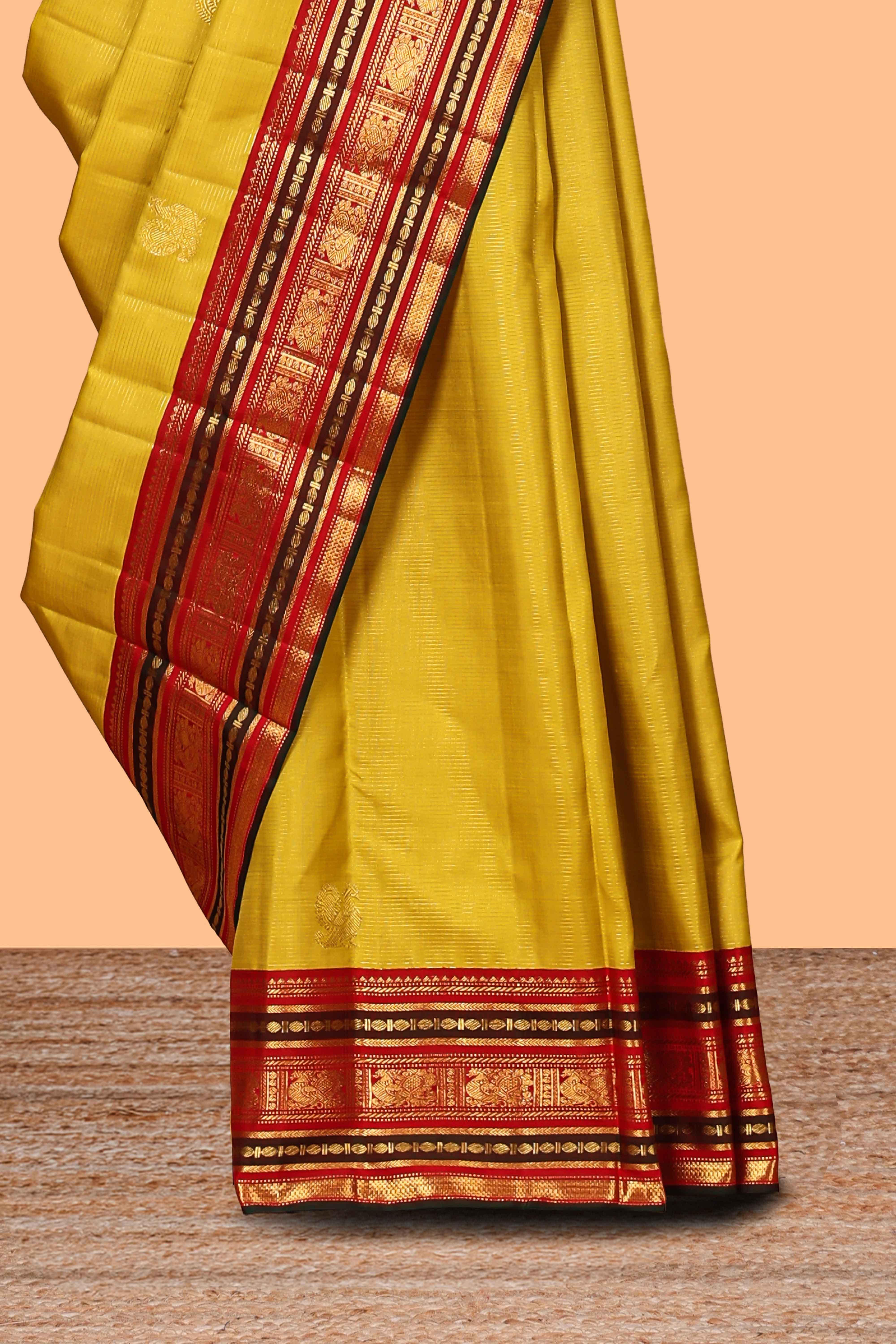 Mustard yellow bird motifs zari design swayamvara pattu saree with contrast border and blouse