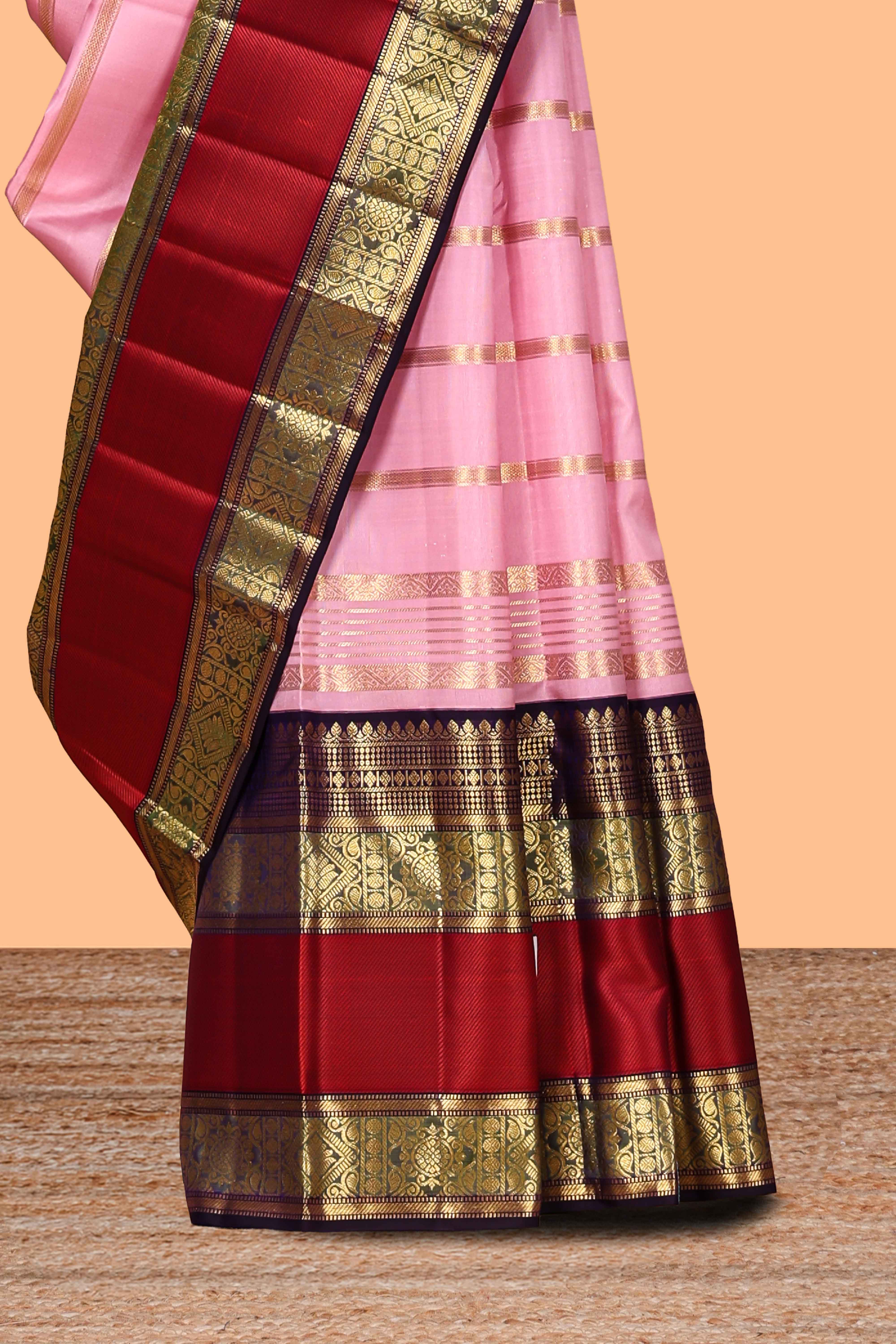 Pink striped zari design swayamvara pattu saree with contrast zari border and blouse