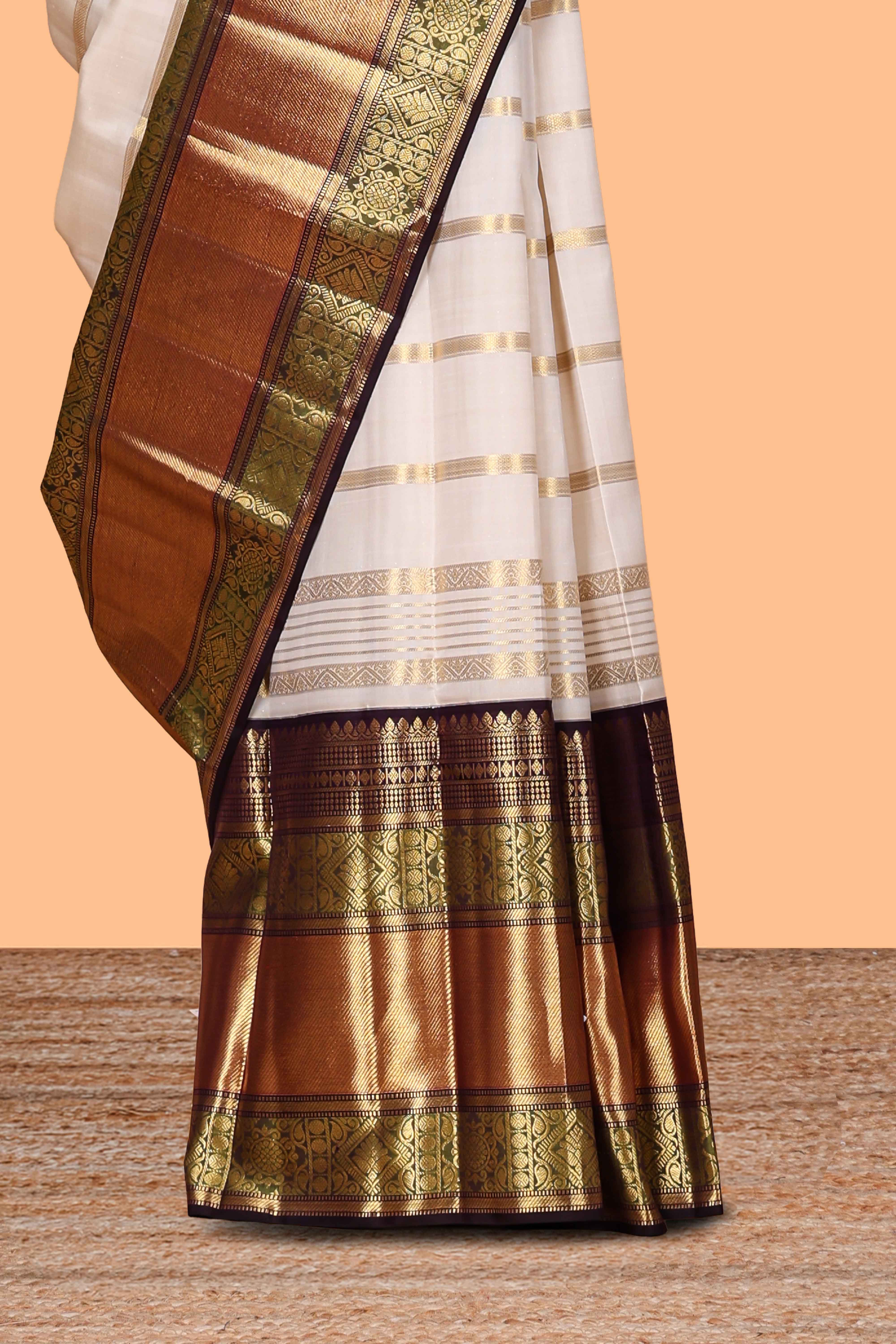 White striped zari design swayamvara pattu saree with contrast zari border and blouse