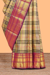 Cream checked swayamvara pattu saree withcontrast zari border and blouse