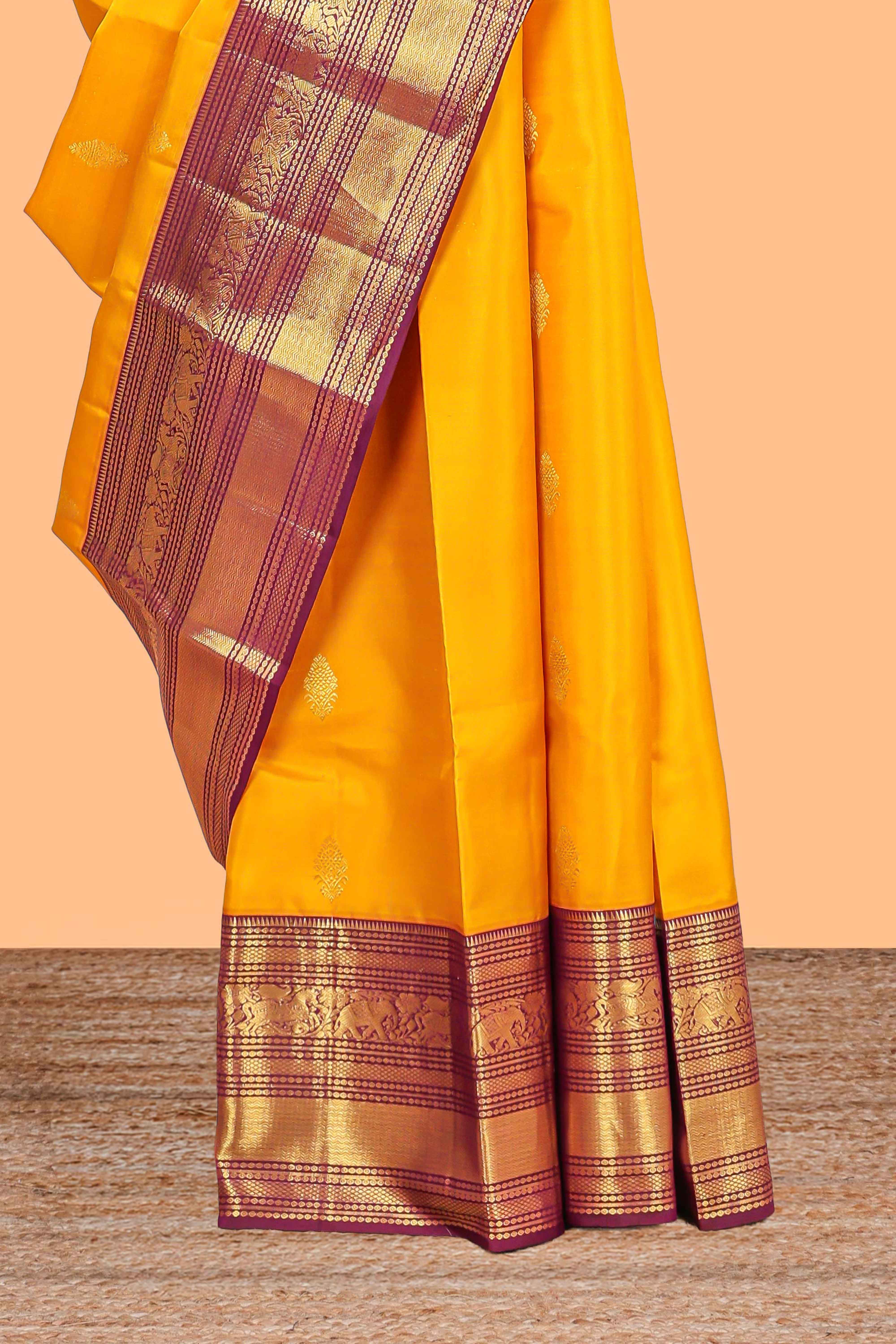 Bright yellow zari butta designs swayamvara pattu saree withcontrast zari border and blouse