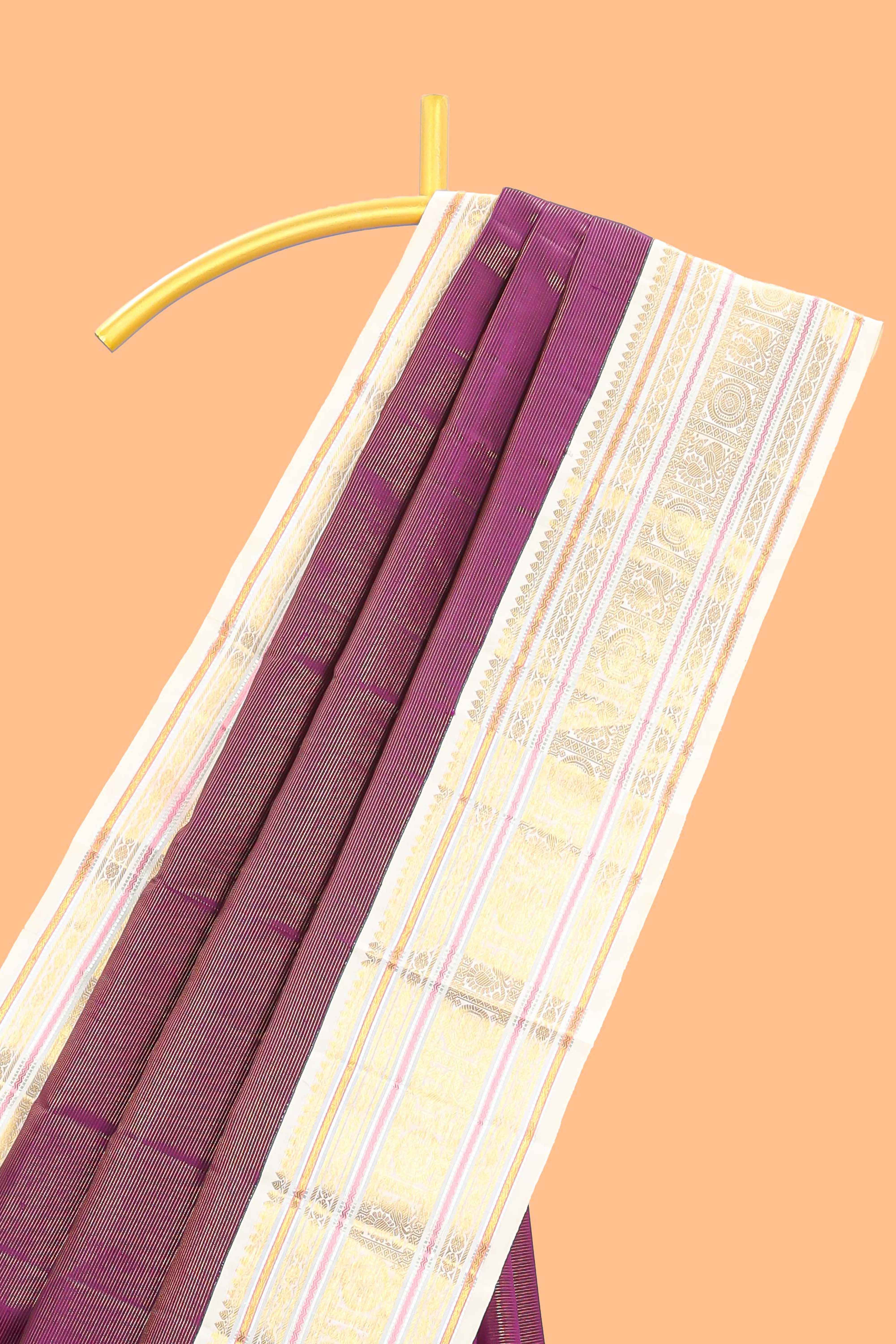 Deep wine striped swayamvara pattu saree withcontrast zari border and blouse