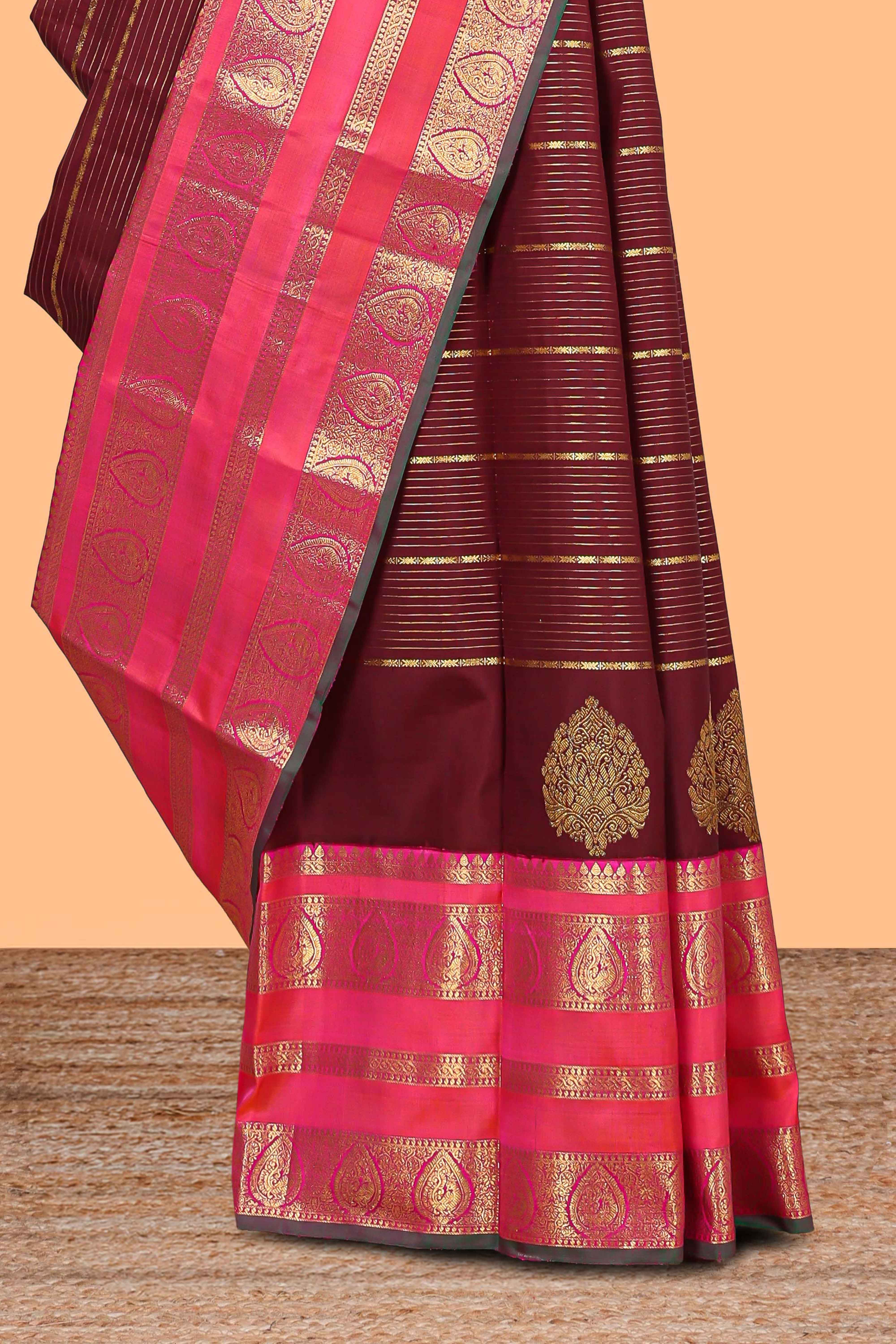 Maroon striped swayamvara pattu saree withcontrast zari border and blouse