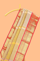 Cream with warm-toned checked swayamvara pattu saree with contrast zari border and pallu along with plain blouse