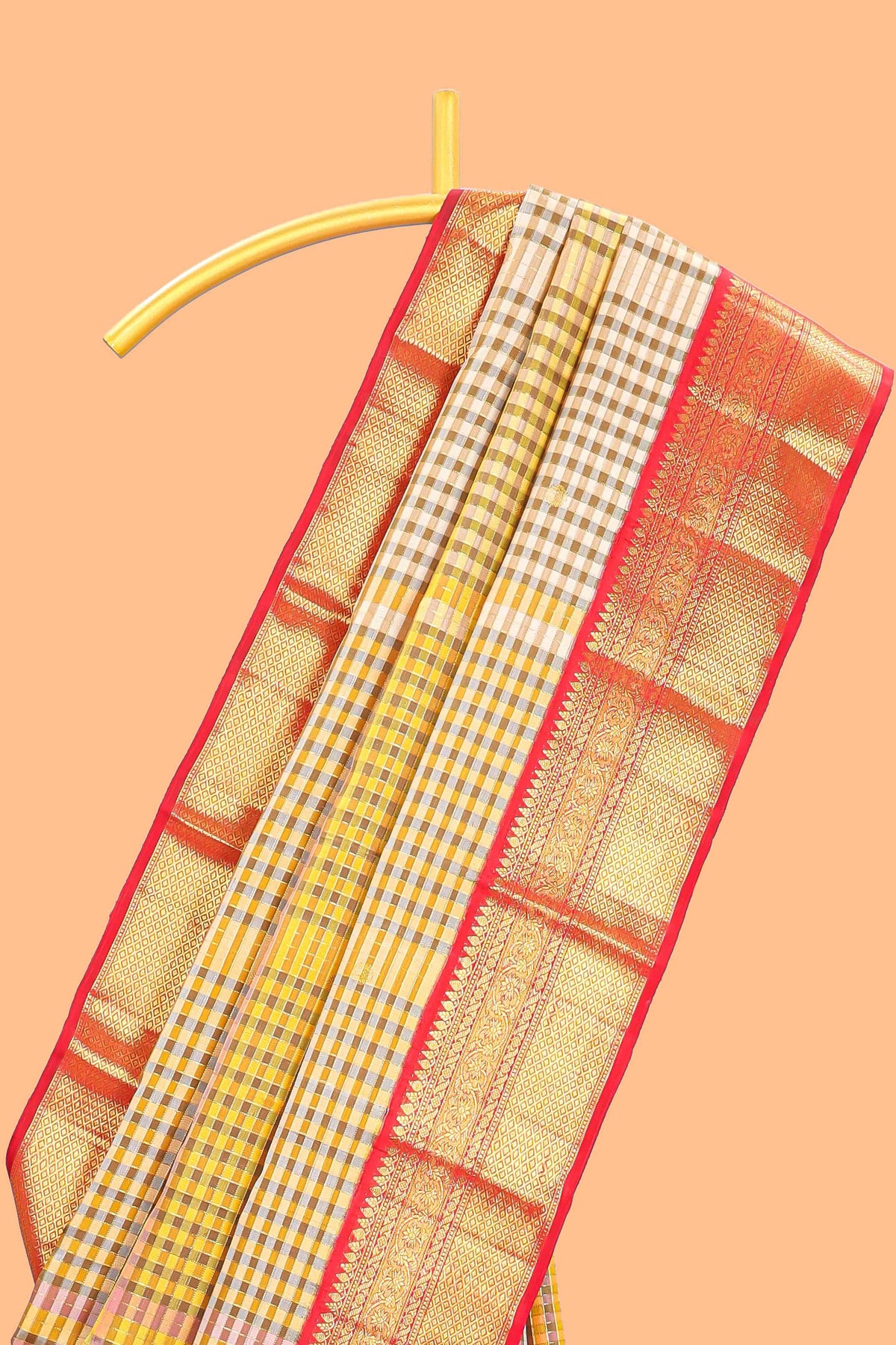Cream with warm-toned checked swayamvara pattu saree with contrast zari border and pallu along with plain blouse