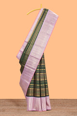 Dark green zari striped swayamvara pattu saree with contrast lavender zari border and pallu comes with plain blouse