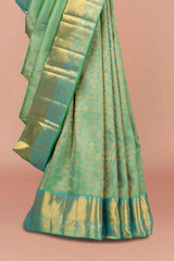 Silver silk saree with green border