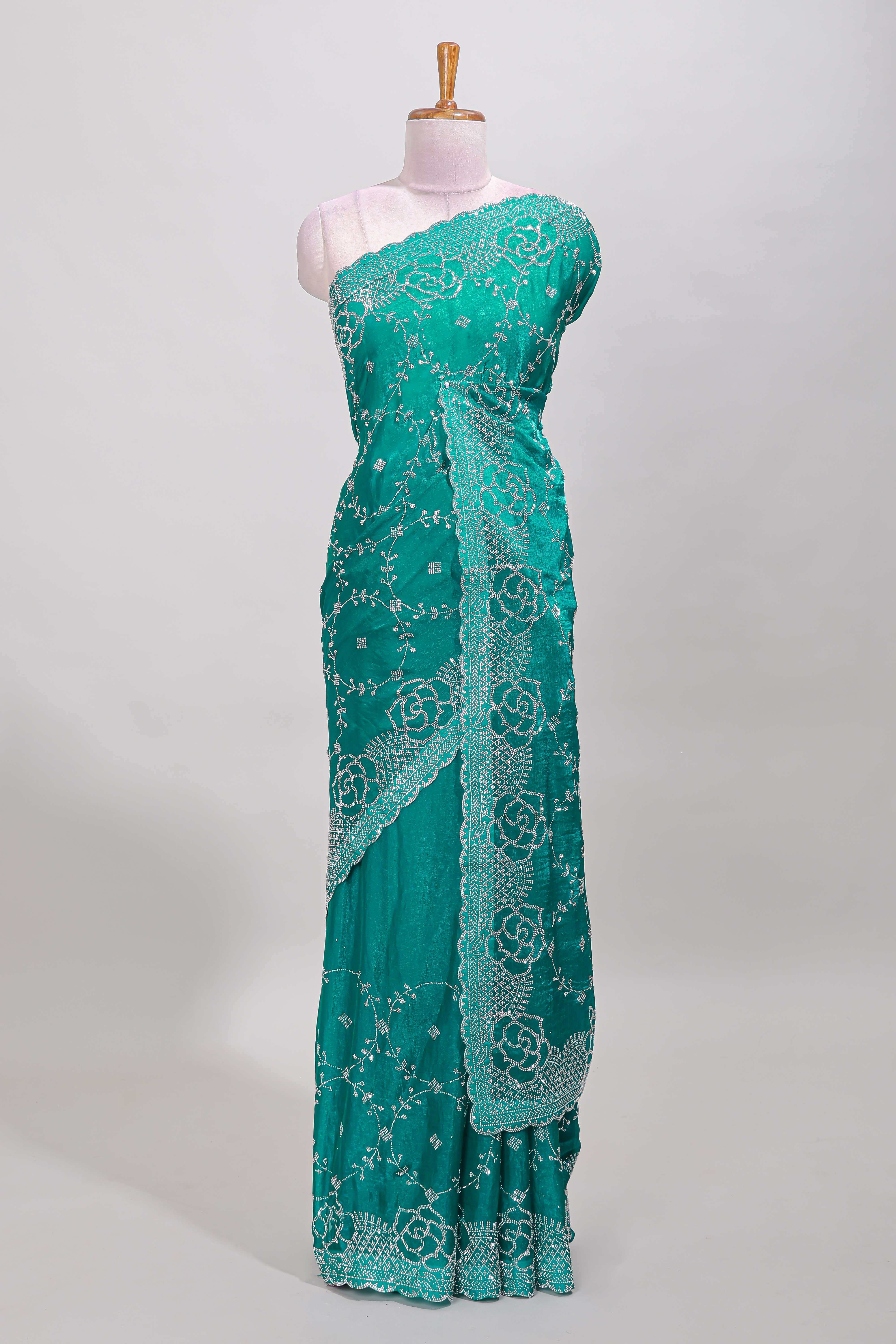 Turquoise stonework saree