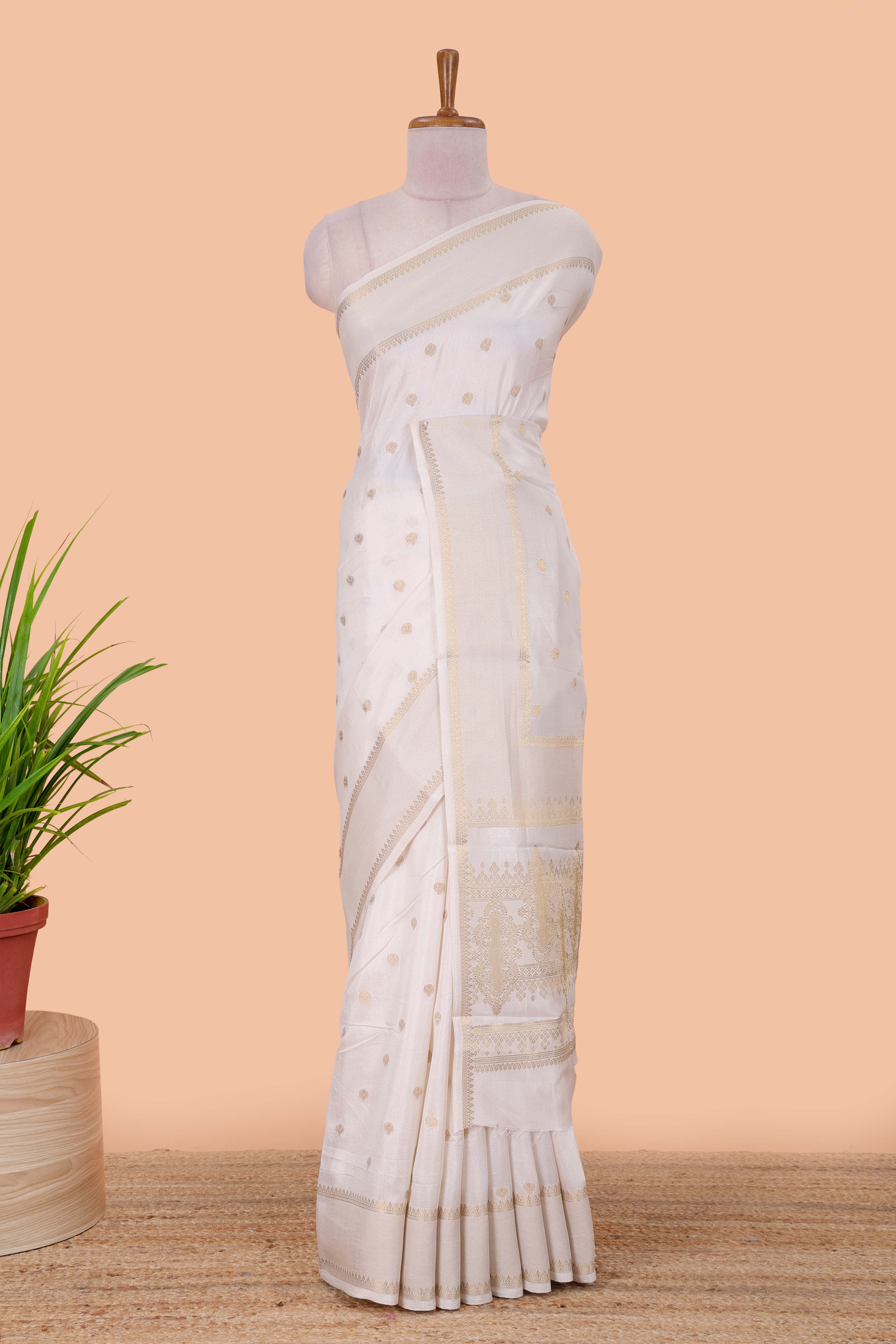 White Zari butta motif accents