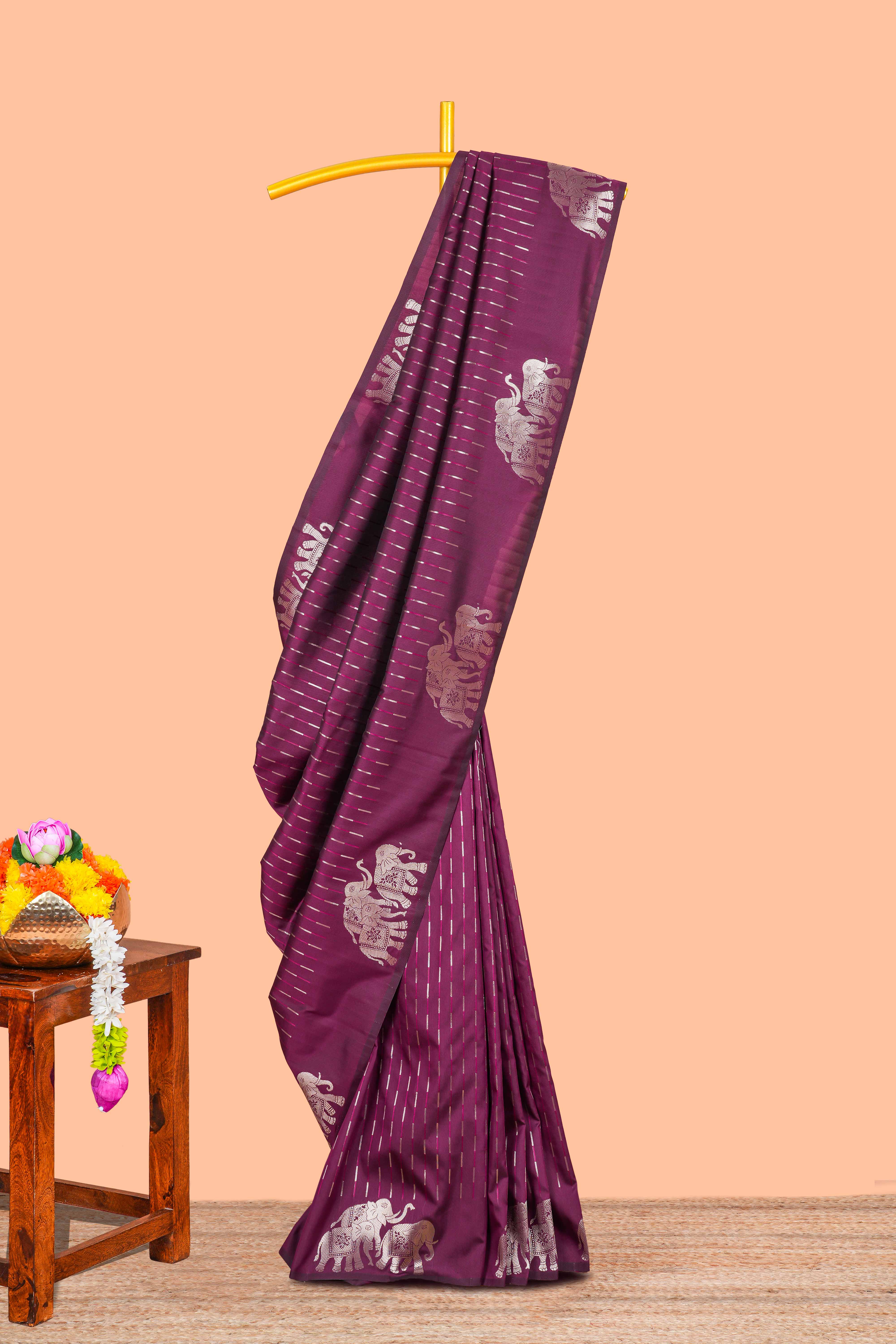 Wine purple semi soft silk zari butta saree