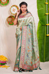 Pastel green floral and animal themed banarasi silk saree with contrast border matching blouse