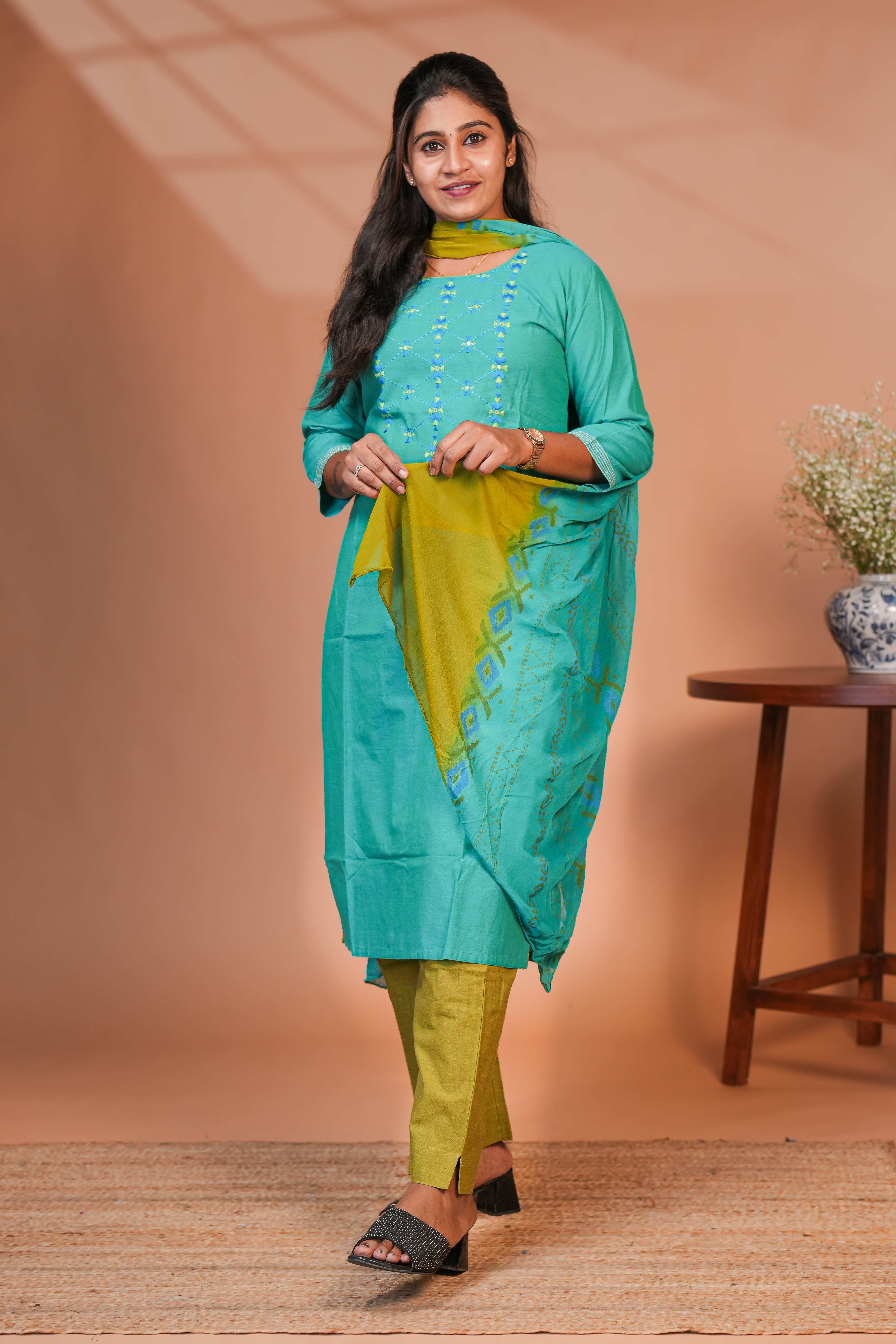 Green embroidery geometric design round neck salwar set with 3/4th sleeve, self bottom and matching dupatta